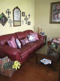 Another View of Palliser Burgundy Leather Sofa with Various Throw Pillows 