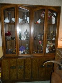 China Cabinet - full of collectibles and various other items.