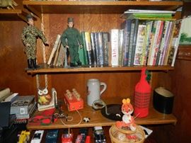 Garage is full of collectibles, toys, cars, etc.