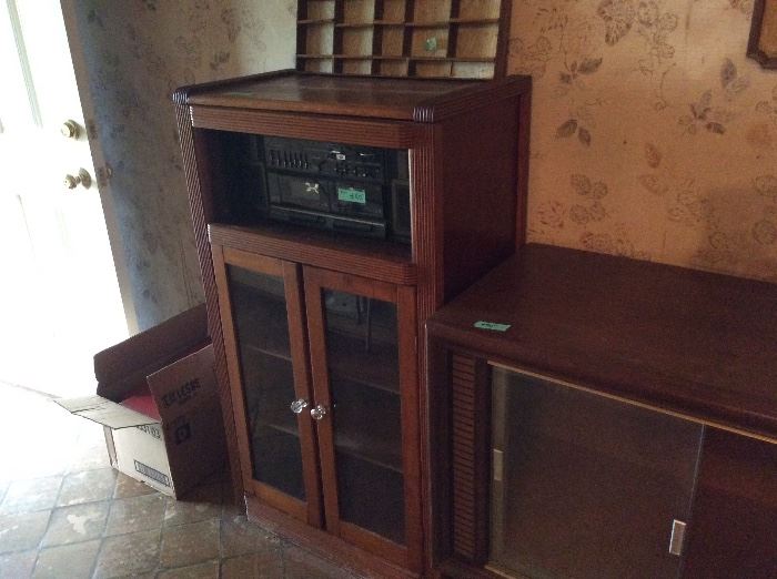 Entrance holds box of books, entertainment cabinet, vintage homemade open display shelf, TV cabinet ready to repurpose. 
