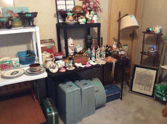 Better view of the Samsonite and collectibles