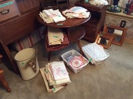 Wastebasket, linens, shadow boxes, round tiered table