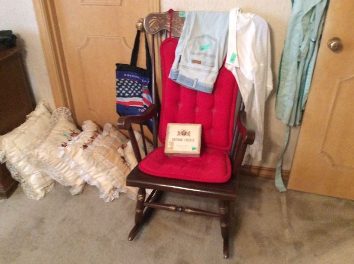 pillows, rocking chair, clothing, bag