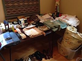 Linen, towels, bedding, table cloths, Twin bedspread (like new), misc. office items, paper cutter