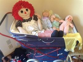 Pram and Huge Raggedy Ann Doll. 