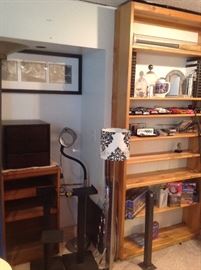 many speaker stands and toy cars