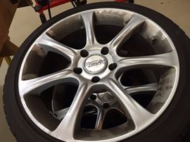 TWO SETS OF TIRES: ONE SET OF 4 BWM M3 18" SNOWTIRES AND WHEELS.   OTHER SET OF 4 AUDI S4 17" SNOWTIRES AND WHEELS