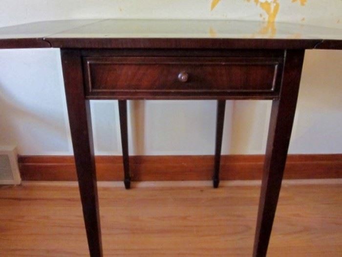 Vintage solid mahogany double drop-leaf table with drawer, by Imperial, Grand Rapids, MI.  Smaller size; measures 28" tall, 26" deep, 19-1/2" wide (with leaves down), 36-1/2" (with leaves open).