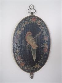 A pair of bird plaques.