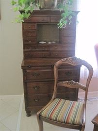 Small secretary desk and rose carved chair.
