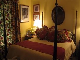 Four poster queen size bed with bedding(mattress is not for sale). Matching curtains.