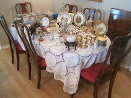 Queen Anne dining table with 8 chairs.