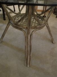 Base of the glass topped round table.