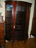 antique bow front china cabinet