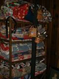 Many many old handmade quilts