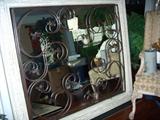 large mirror from re-claimed wood & an iron gate from New Orleans