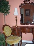 antique vanity, mirror, and chair