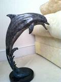 bronze dolphin sculpture