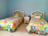 twin beds (white headboards)