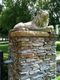 pair of massive cement lions