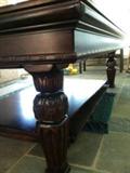 this is the leg of the pool table (the cover is being stored underneath the table)