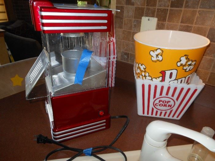 popcorn machine and buckets 