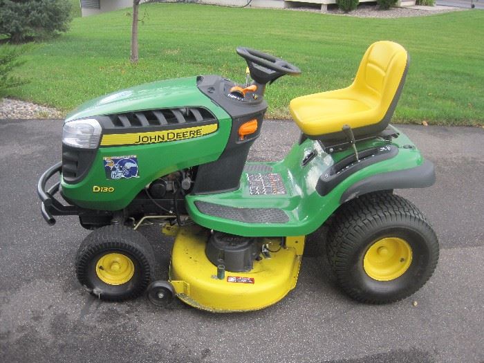 John Deere D130 riding mower with 126 hours of use.