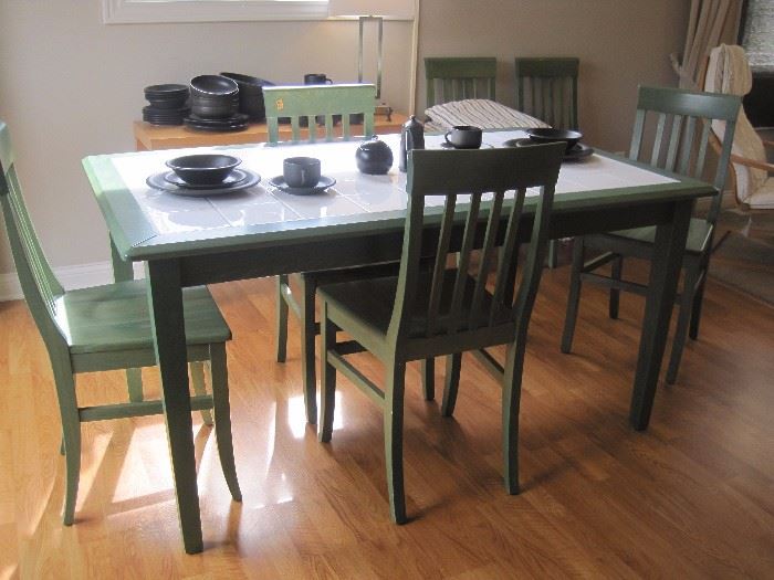 Tile topped dining set with 6 chairs.