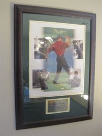 Tiger Woods autographed photo/poster of grand slam win.