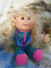 Original cabbage patch blonde , brown eyed doll. ($65 OBO)

Her hair is curly and she's wearing a blue pajama with a sleeping mask over her eyes . 

She's in GREAT condition! 

VERY BEAUTIFUL DOLL. 
