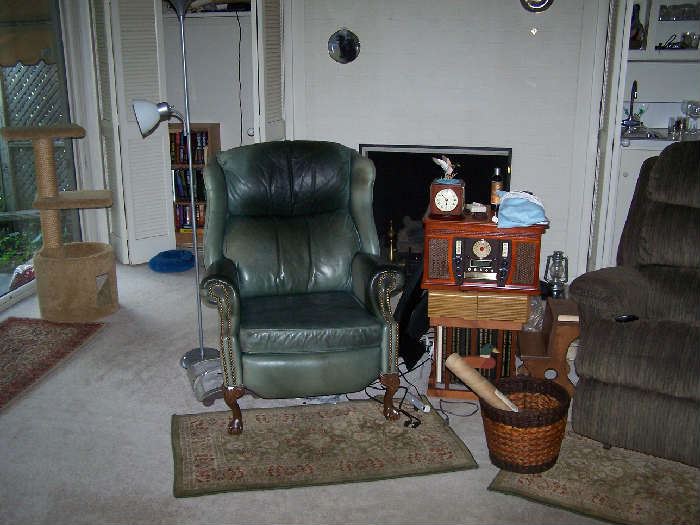ONE OF A PAIR OF LEATHER RECLINERS, SMALL TABLE & MISC.