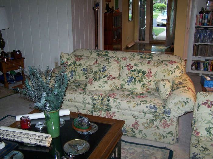 ONE OF A PAIR OF FLORAL LOVESEATS, VITRINE-TYPE COFFEE TABLE & MISC.