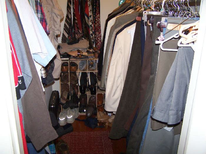 ONE OF THE CLOSETS OF MEN'S CLOTHING