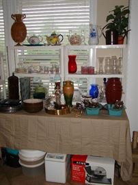 Teapots, pottery, glass