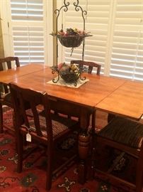 Antique breakfast table with 4 chairs (upholstered seats); 2-tiered decor