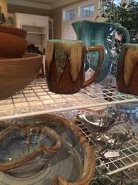 Pottery pieces in blues and browns