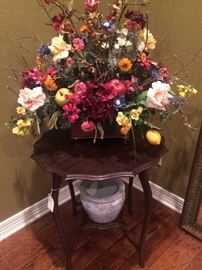 Side table and colorful floral arrangement