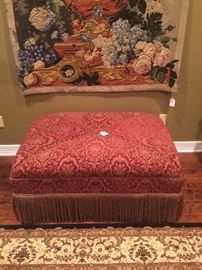 Over-sized ottoman trimmed with heavy duty fringe