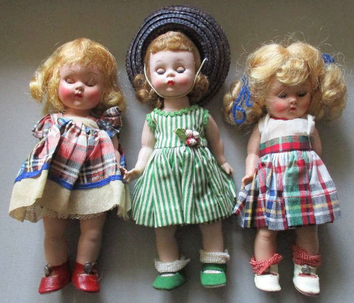The middle doll is a rare Madame Alexander Alex-kins