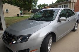a 2010 Ford Fusion SE.  Silver in color, low mileage and in great condition.