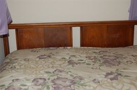 A headboard that goes has a matching dresser and chest of drawers.   The mattress w/box springs as also for sale as well.