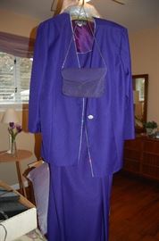 A deep purple, Alex brand long dress.  Very elegant with simple, classic lines.  Makes a great Mother of the Bride dress.  Comes with purse as well.