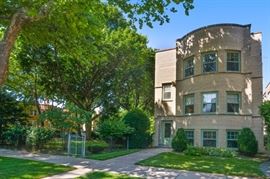 This vintage 2-flat with huge side lot is also for sale!