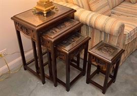 Vintage Asian Wood Carved Nesting Tables with Glass Tops (There are 2 sets of these.)