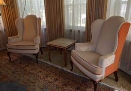Pair of Neutral Upholstered Queen Anne Wingback Chairs with Orange Backs and Orange Piping
