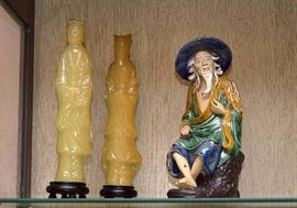 Asian Figure Candles and Ceramic Mudman Figure
