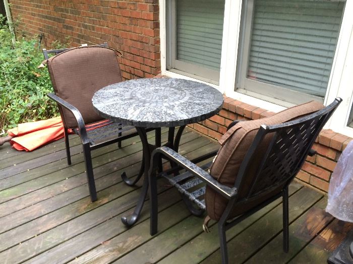 There are 2 of these small patio tables 