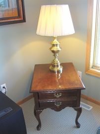 A pair of Stiffel brass lamps. American Drew table.