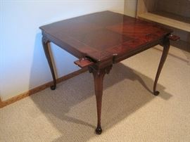 A well made mahogany game table.