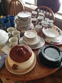 Wooden kitchen table with four chairs (heavy wood construction) dinner ware and kitchen accessories